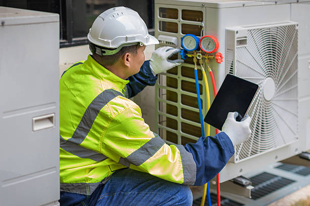 Professional Hvac technician working in Goodrich, TX